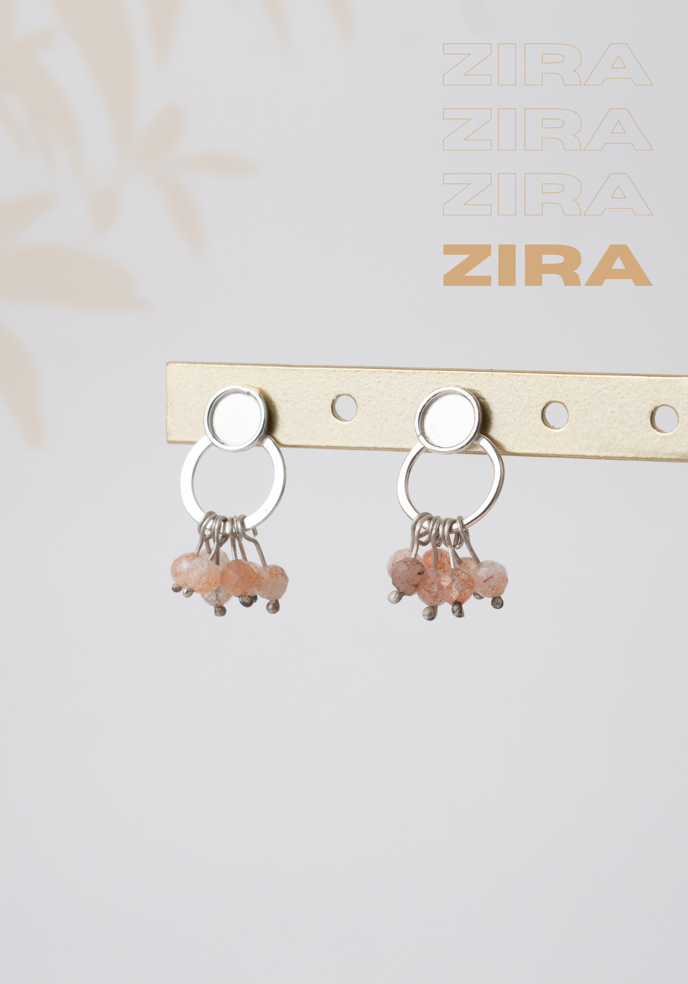 Aretes Zira: Elegancia Natural en Movimiento