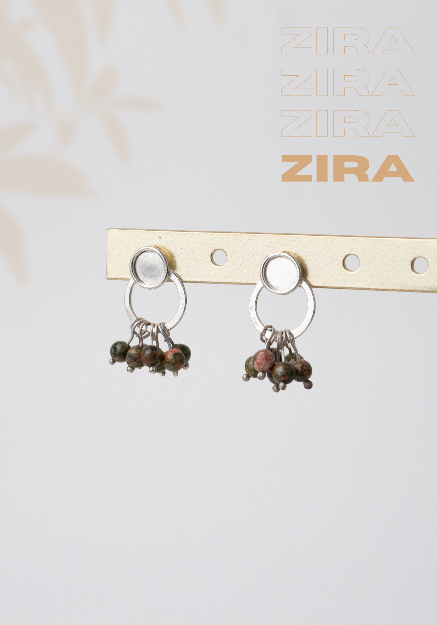 Aretes Zira: Elegancia Natural en Movimiento