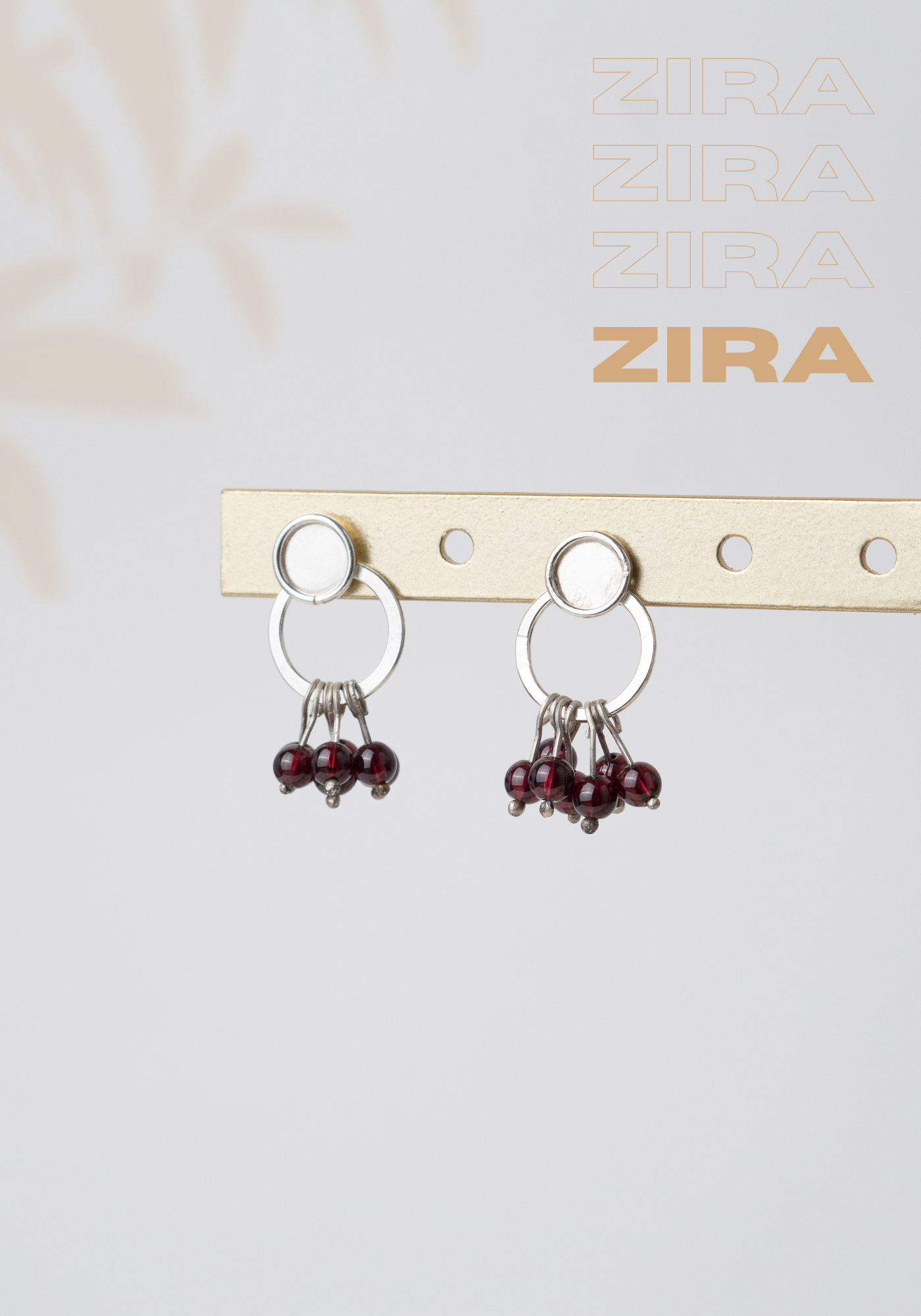 Aretes Zira: Elegancia Natural en Movimiento