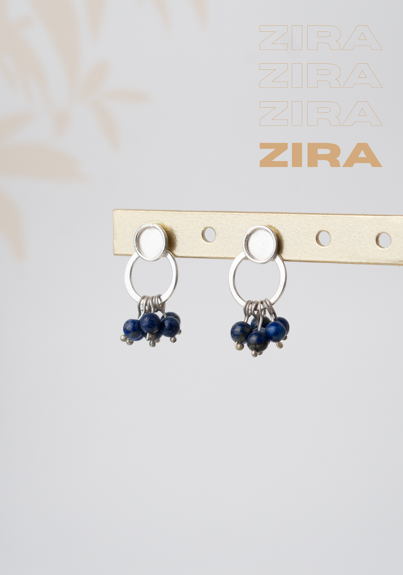 Aretes Zira: Elegancia Natural en Movimiento