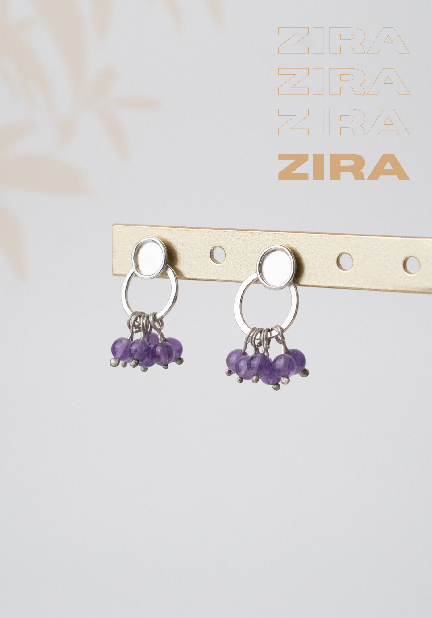 Aretes Zira: Elegancia Natural en Movimiento